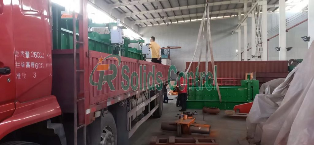 Shale shakers are being loaded onto truck